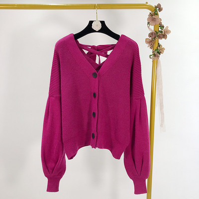 Σύντομή γυναικέια ζακέτα με κορδόνια στη πλάτη