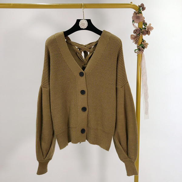 Σύντομή γυναικέια ζακέτα με κορδόνια στη πλάτη