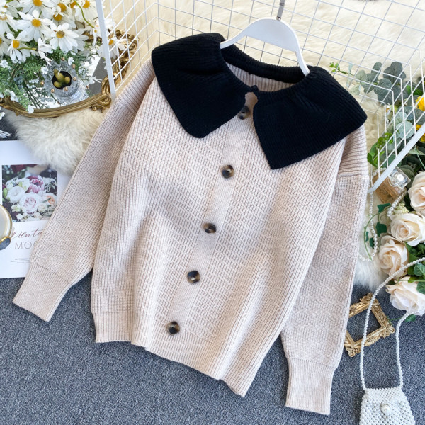 Modern női mellény gombokkal és gallérral