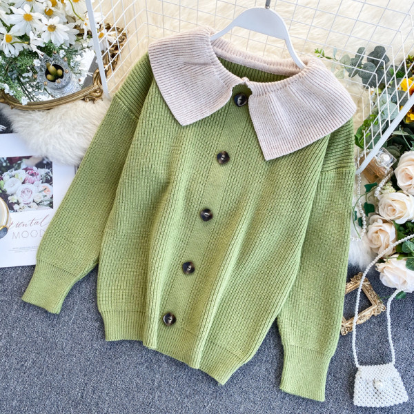 Modern női mellény gombokkal és gallérral