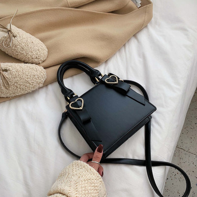 Μοντέρνα γυναικεία έκο δερμάτινη τσάντα με δύο λαβές σε τέσσερα χρώματα