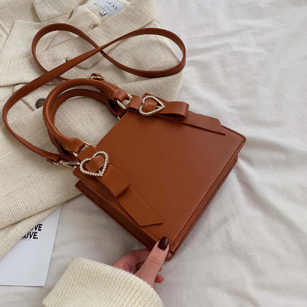 Μοντέρνα γυναικεία έκο δερμάτινη τσάντα με δύο λαβές σε τέσσερα χρώματα