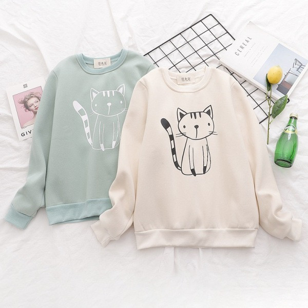 Μοντέρνα γυναικεία μπλούζα με στρογγυλό λαιμόκοψη και εφαρμογή σε πράσινο και μπεζ χρώμα