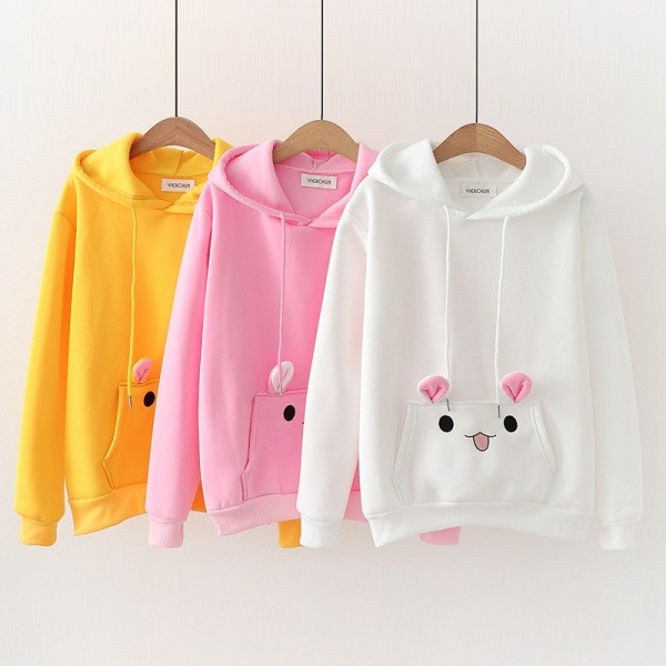 Modern női pulóver kapucnival fehér, rózsaszín és sárga színben