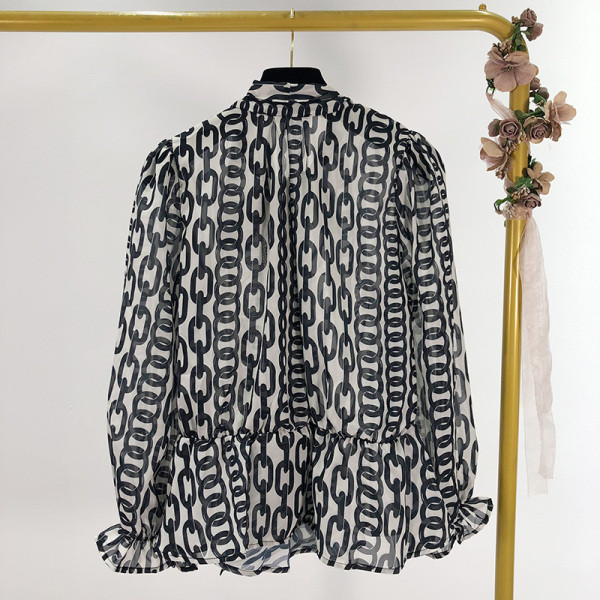 Női széles ing szalaggal a nyakkivágáson, színes mintával