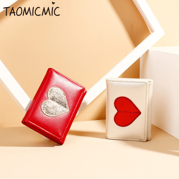 Napi női pénztárca hat színben hímzéssel