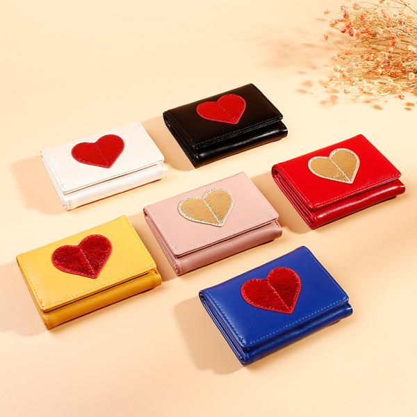 Napi női pénztárca hat színben hímzéssel