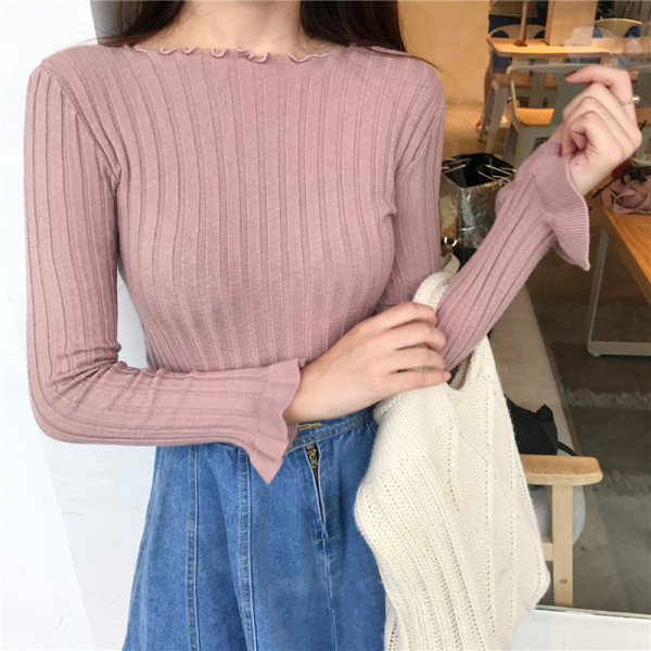 Női testhezálló blúz kerek nyakkivágással, több színben