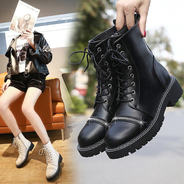 Női bőrcsizma lapos talppal és fűzővel