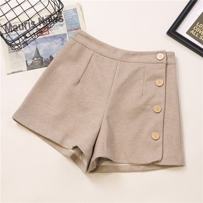 Modern női nadrág négy színben, gombokkal, magas derékkal