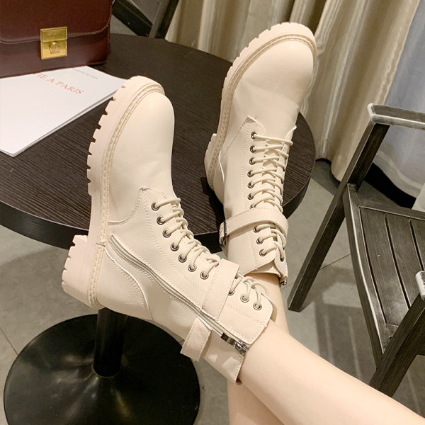 Női bőr téli tornacipő vastag talppal, fekete-fehér színben