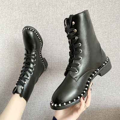 Γυναικείες μοντέρνες μπότες με μεταλλικά τρουξ - δύο μοντέλα