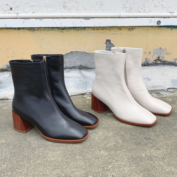 Női bőrcsizma vastag sarkú fekete-fehér színben