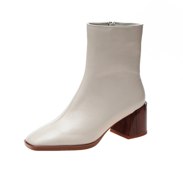 Női bőrcsizma vastag sarkú fekete-fehér színben