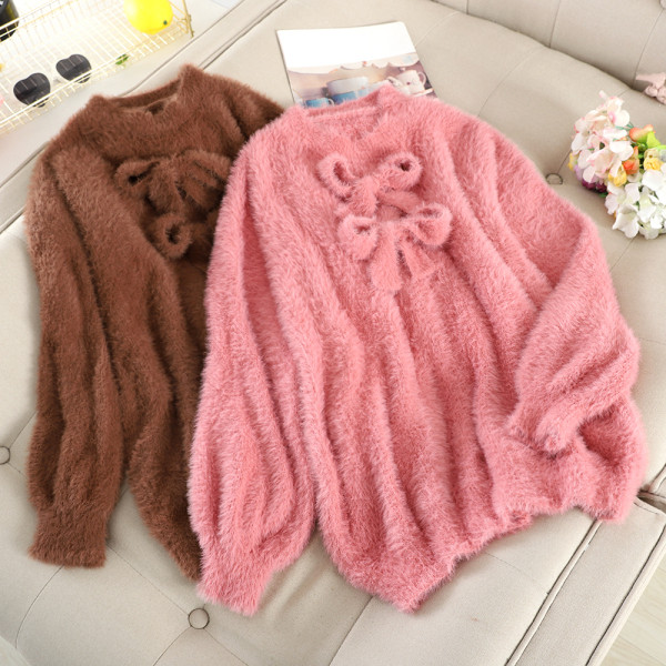 Női pehelypulóver szalagokkal, három színben