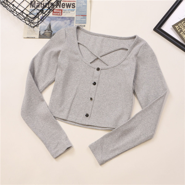 Γυναικεία κομψή μπλούζα με  τέσσερα χρώματα κουμπιά και λαιμόκοψη O