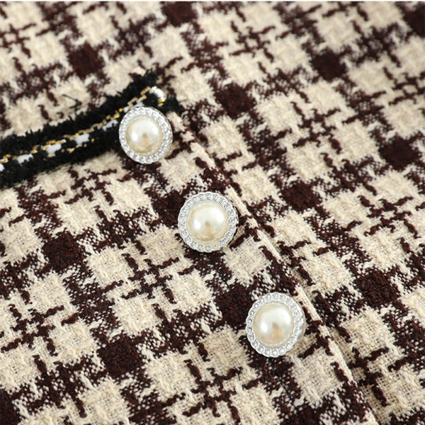 Μοντέρνα γυναικεία μπλούζα με ζώνη σε δύο χρώματα