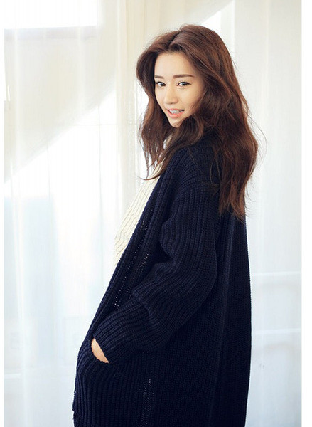 Női őszi mellény hosszú modell rózsaszín és fekete zsebekkel