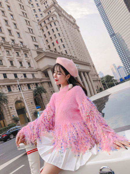 Rózsaszín színű női pulóver rojtokkal