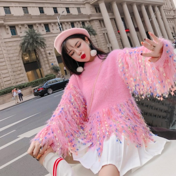 Rózsaszín színű női pulóver rojtokkal