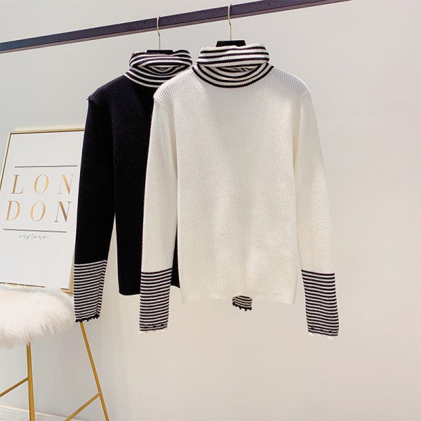 Alkalmi női pulóver magas gallérral fehér és fekete színben