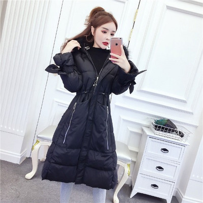 Hosszú téli kabát cipzárral és kapucnival