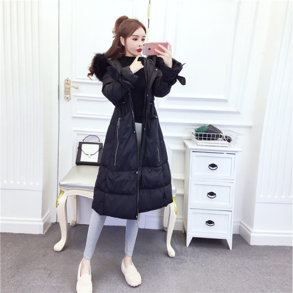 Hosszú téli kabát cipzárral és kapucnival