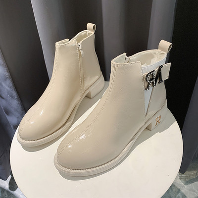 Fém elemes női csizma fekete és bézs színben