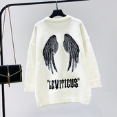 Hosszú pulóver fehér és fekete hímzéssel