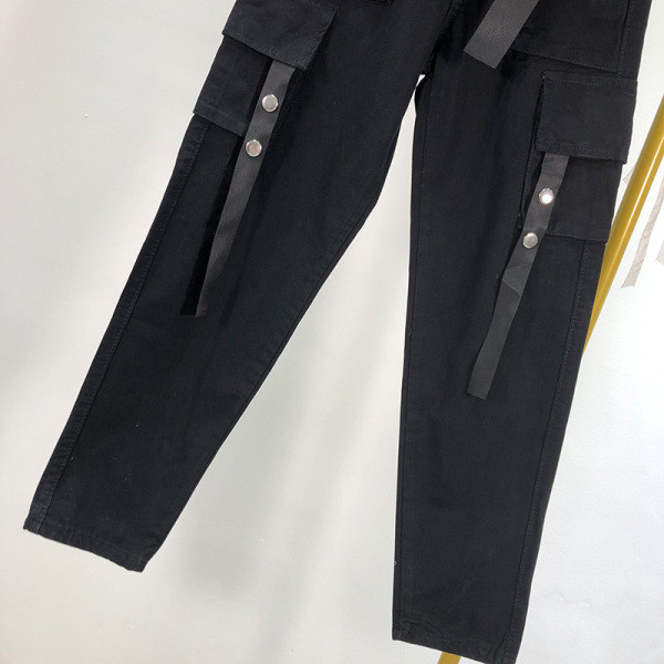 Női ellentmondásos alkalmi nadrág zsebekkel és övvel