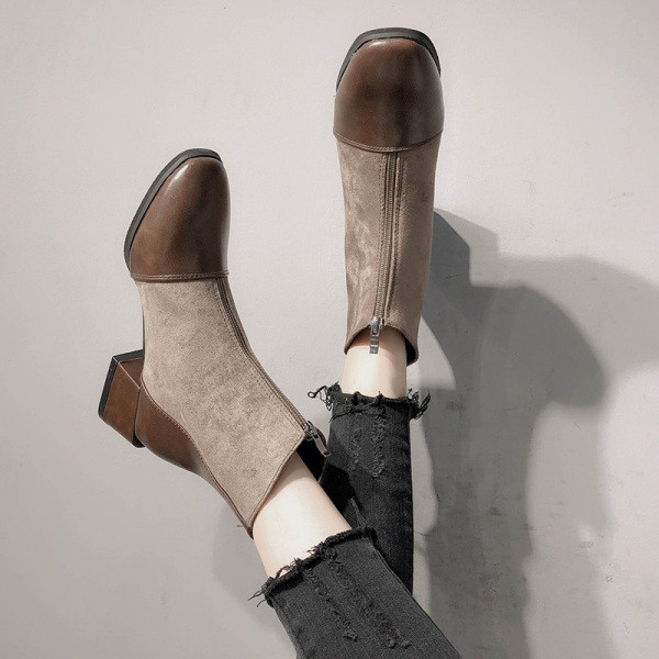 Modern női csizma barna és fekete cipzárral