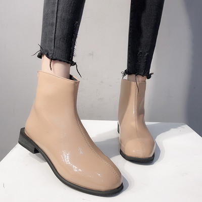 Μοντέρνες γυναικείες μπότες από οικολογικό δέρμα με φερμουάρ σε μαύρο και μπεζ χρώμα