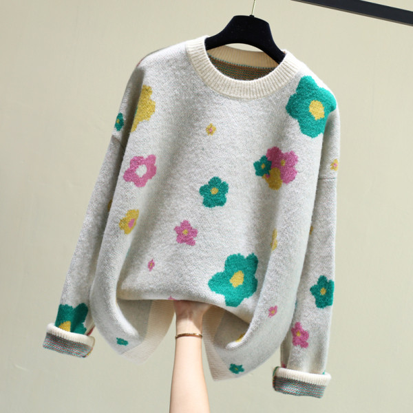 Modern női pulóver kerek nyakkivágással, színes hímzéssel
