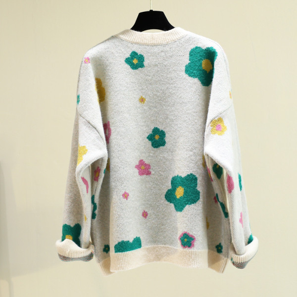 Modern női pulóver kerek nyakkivágással, színes hímzéssel