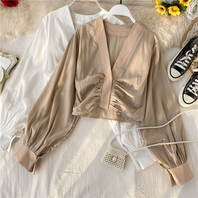 Modern női rövid ing spitz nyakkivágással és hosszú ujjú fekete, fehér és barna színekben