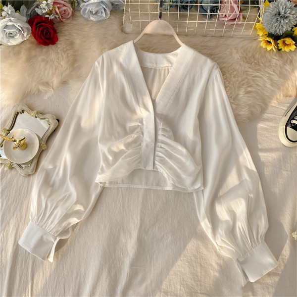 Modern női rövid ing spitz nyakkivágással és hosszú ujjú fekete, fehér és barna színekben