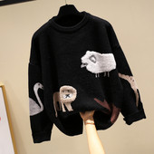 Női téli pulóver kerek nyakkivágással és hímzéssel