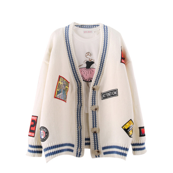 Női alkalmi mellény spitz nyakkivágással és színes emblémákkal