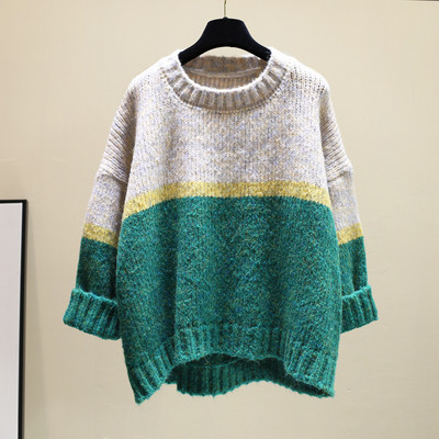 Női téli pulóver kerek nyakkivágással, aszimmetrikus mintával