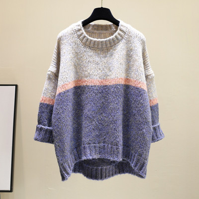 Női téli pulóver kerek nyakkivágással, aszimmetrikus mintával