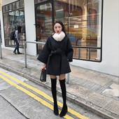 Elegáns, széles női kabát pehellyel