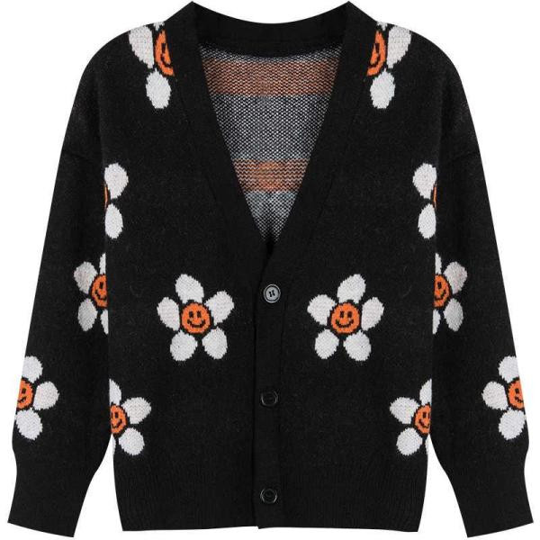 Σύντομη γυναικεία  ζακέτα  σε μπλε χρώμα με χρωματιστώ μοτίβο