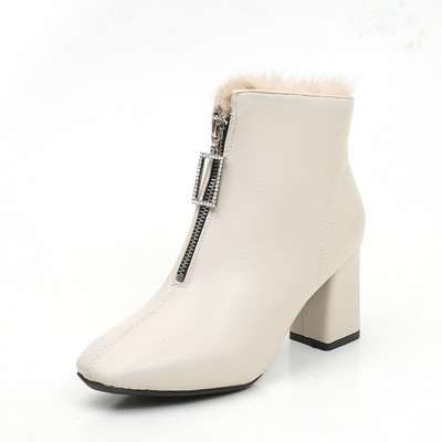Eko bőrből készült alkalmi női csizma cipzárral és puha béléssel fehér és fekete színben