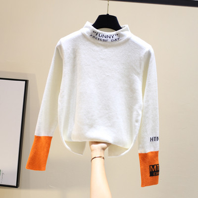 Modern női blúz magas gallérral, fekete-fehér színben