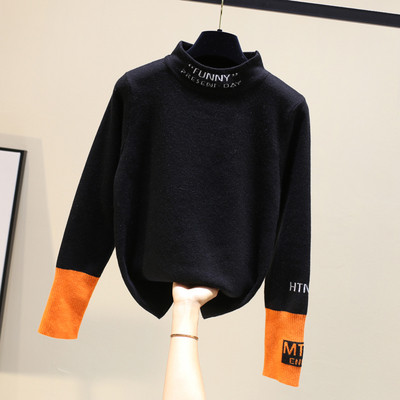 Modern női blúz magas gallérral, fekete-fehér színben