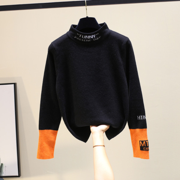 Γυναικεία μοντέρνα μπλούζα με ψηλό γιακά σε μαύρο και άσπρο χρώμα