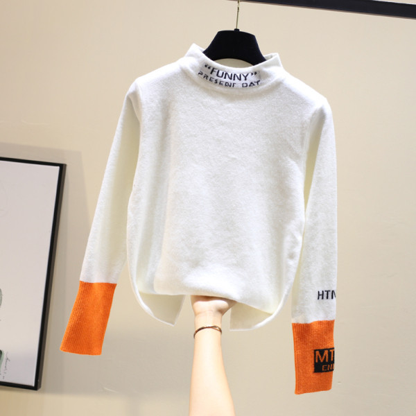 Γυναικεία μοντέρνα μπλούζα με ψηλό γιακά σε μαύρο και άσπρο χρώμα