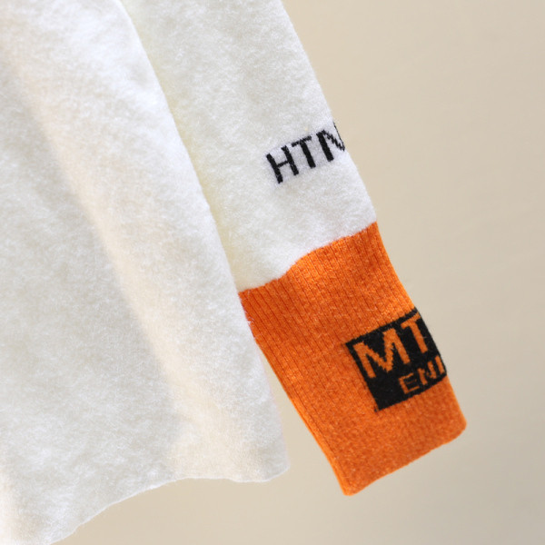 Γυναικεία μοντέρνα μπλούζα με ψηλό γιακά σε μαύρο και άσπρο χρώμα