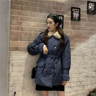 Női téli kabát pehely és fűzős gombokkal