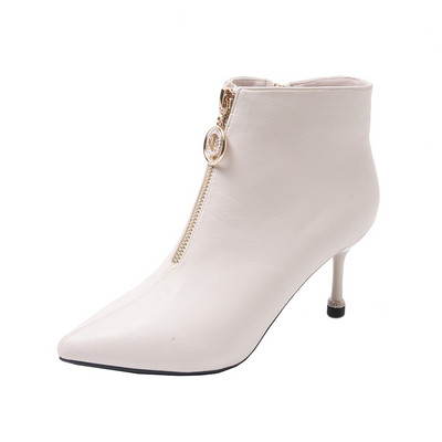 Modern női csizma cipzárral és vékony sarokkal fehér és fekete színben
